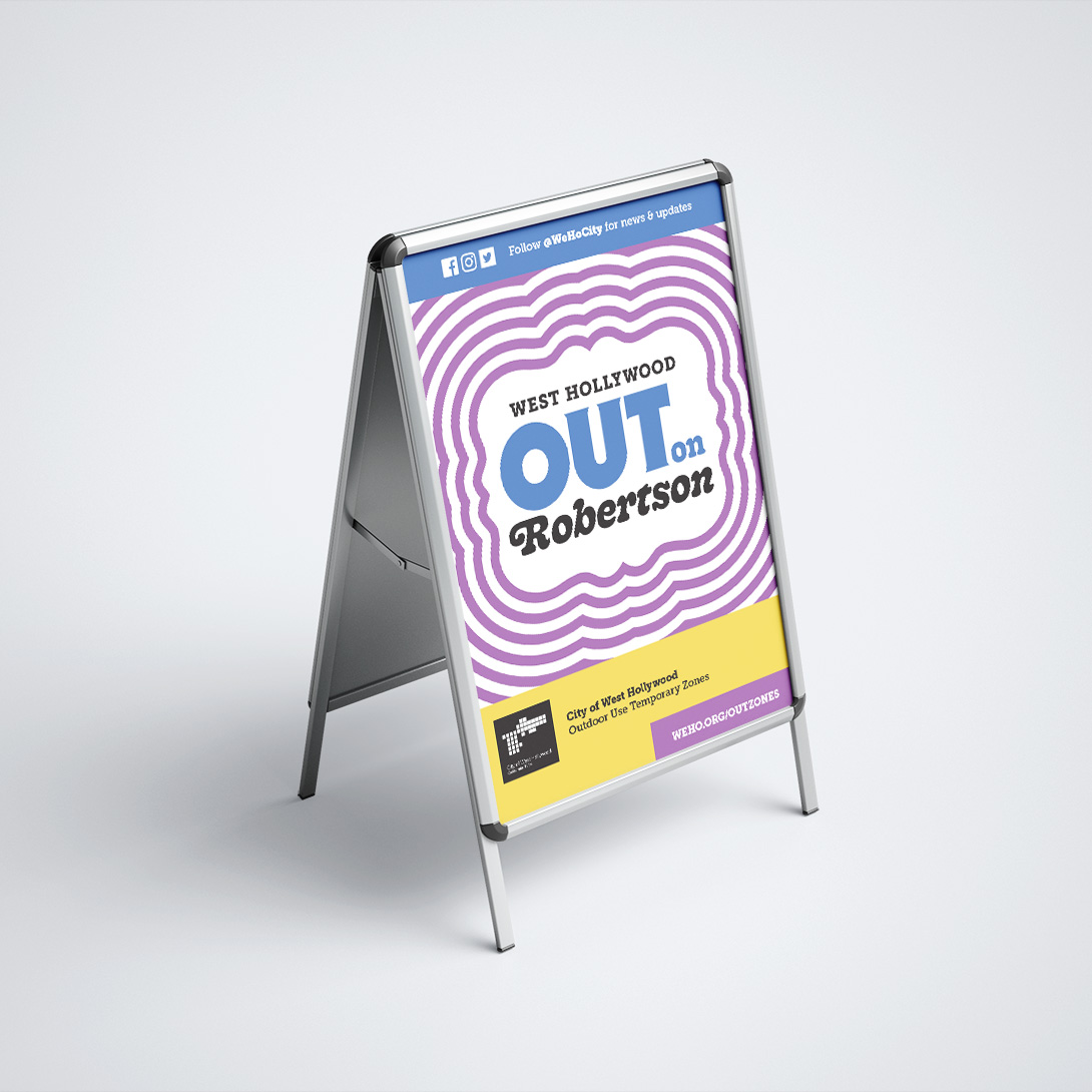 WeHo OUT: OUT on Robertson poster in an A-frame stand. Branding and design by Kilter.